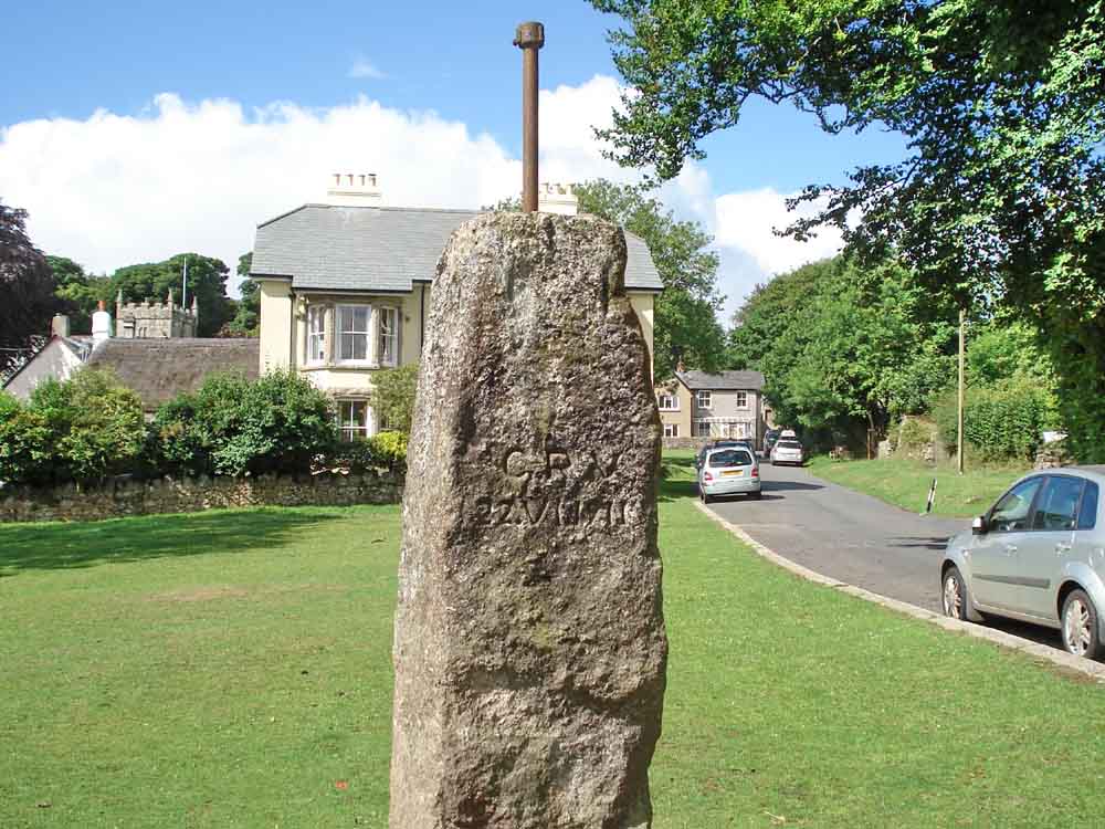 Memorial stone on the village green. Apparently, it bore an oil lamp in times past