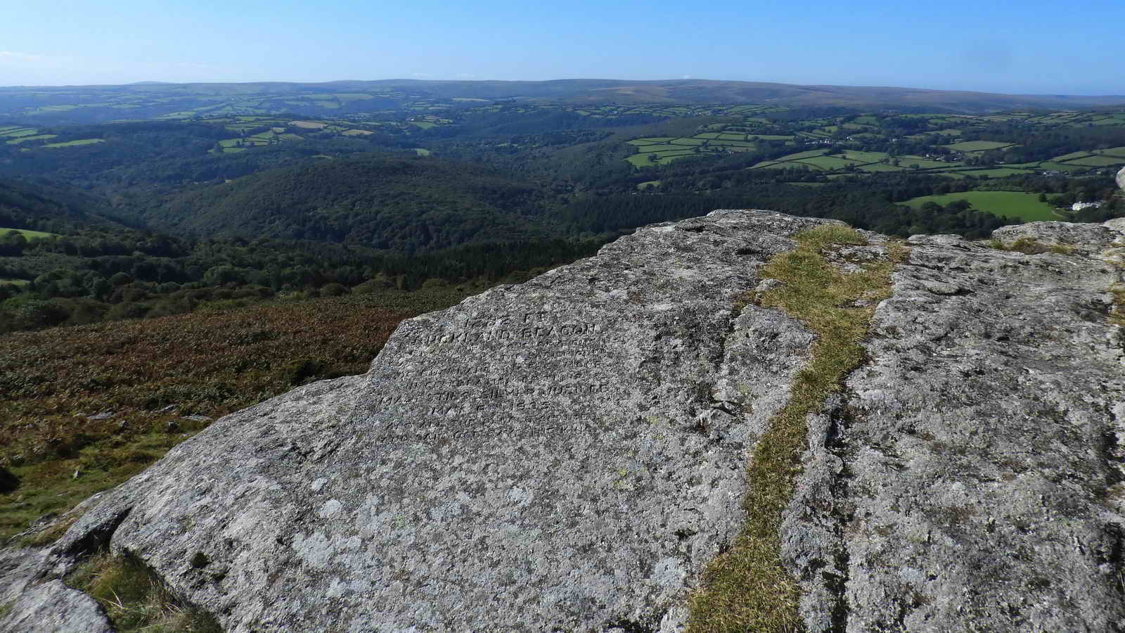 Just above the Commandments Stones, about halfway the top of the beacon, is an angled flat rock that was inscribed in 1935,  known as the Jubilee Stone 