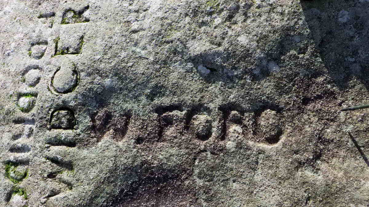 W FORD.  There are at least two other inscriptions nearby but they are very faint