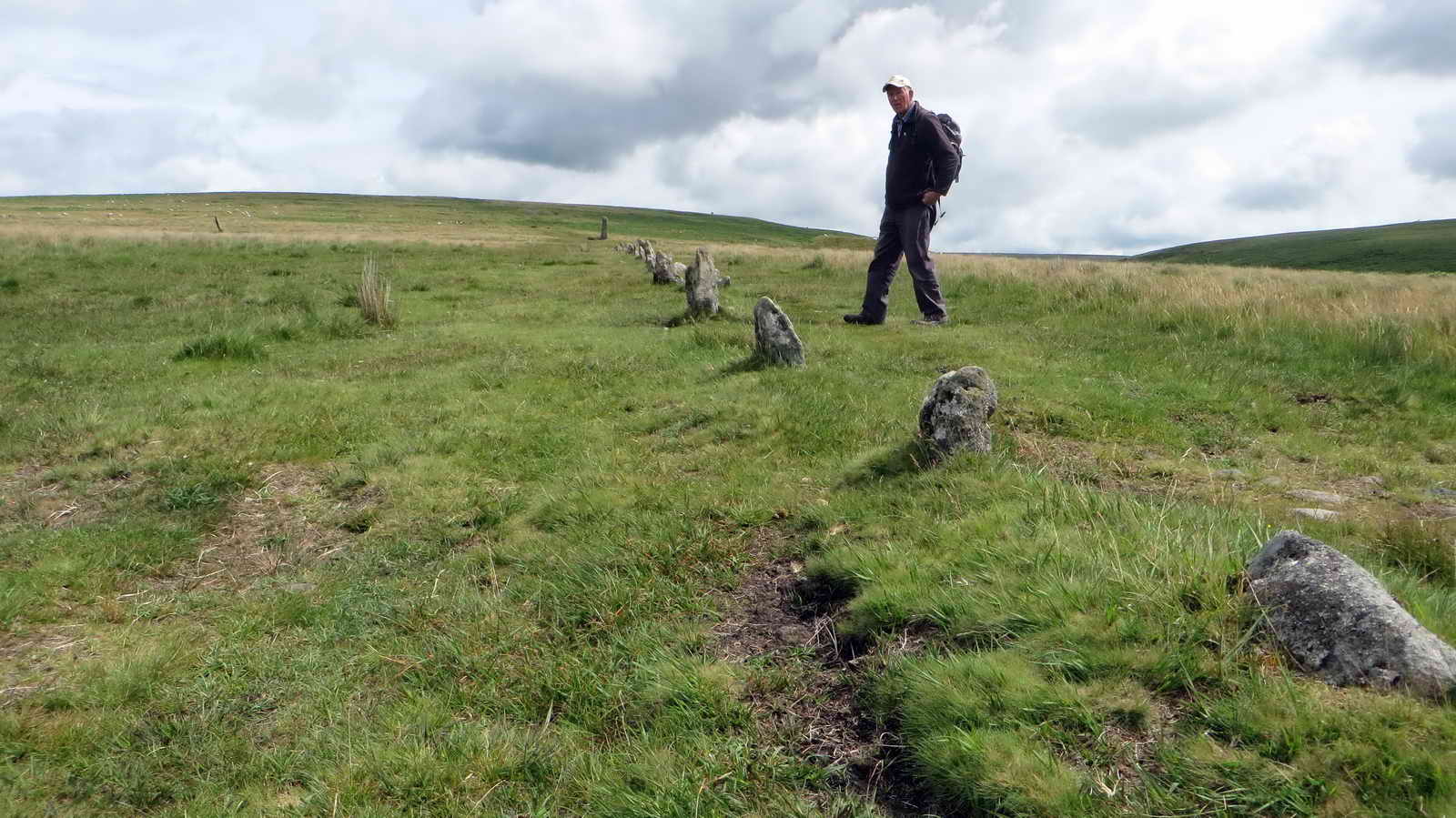 Low-angle photograph to enhance the small stones in the row