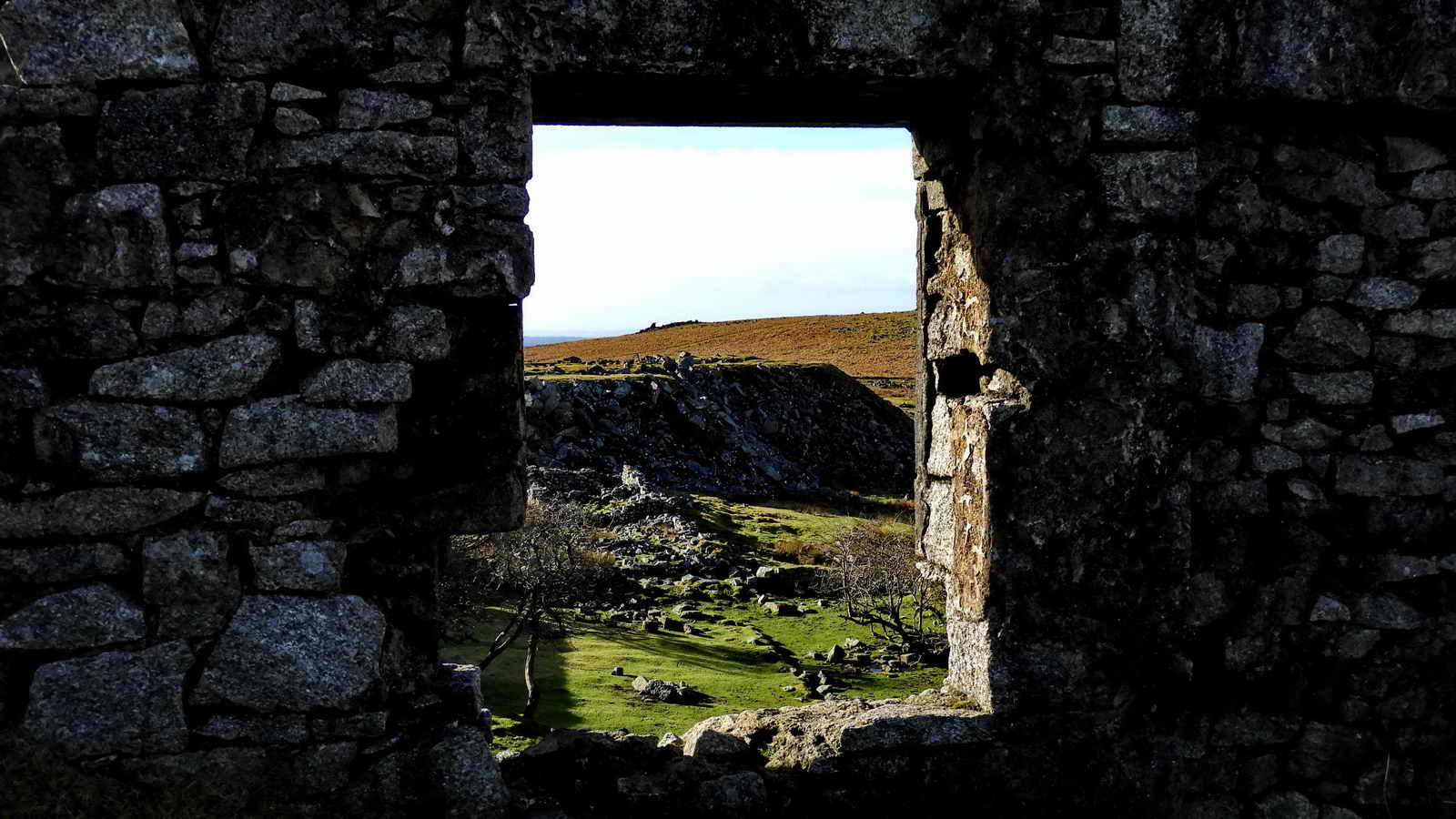 Looking through the window at Big Tip, with Swell Tor on the horizon