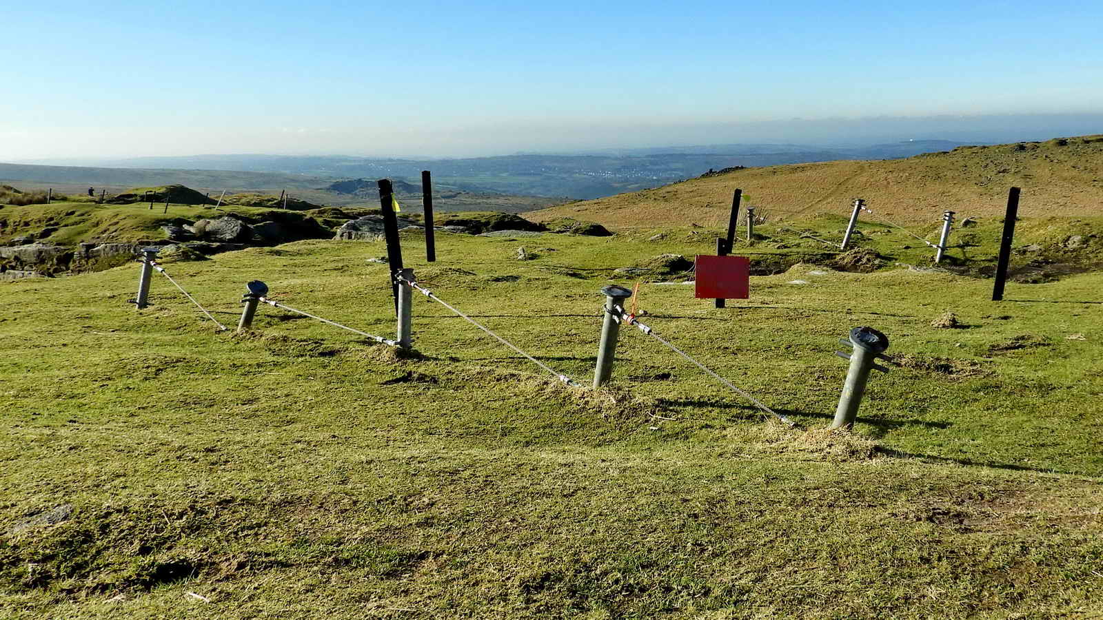 Directly above two of the quarry walls are these stout ground anchors used by the Royal Marines for rope practice