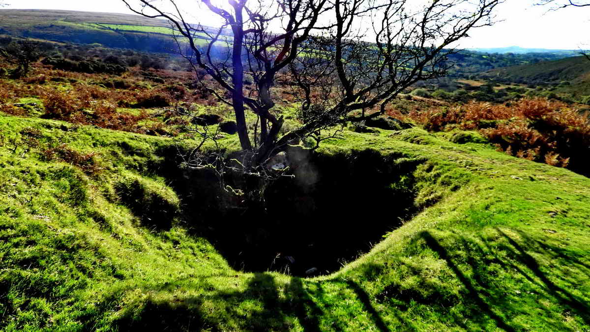 A mining pit beside the path down to the River Lyd