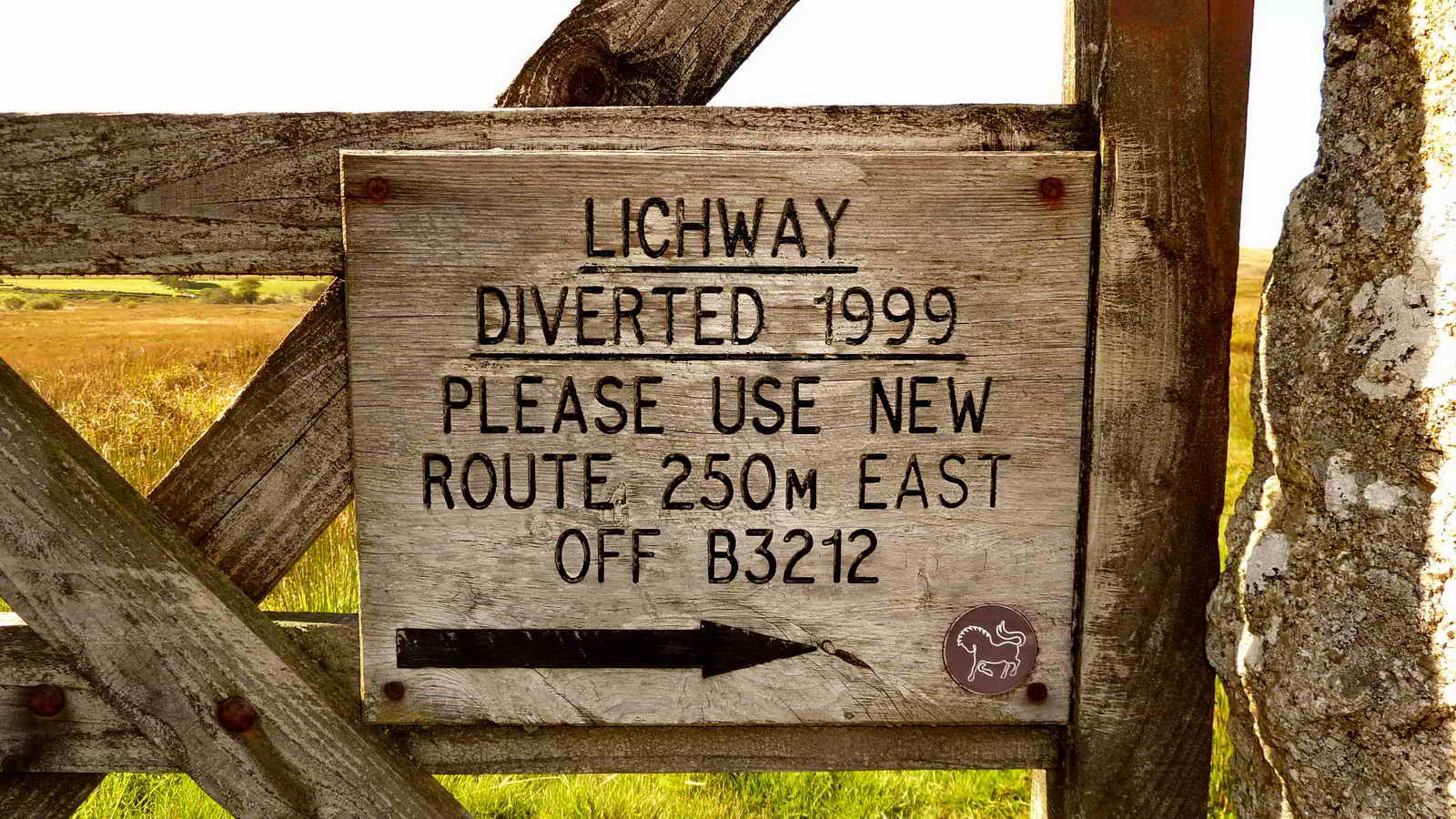 Notice on the original Lich Way gate from the Bridge carpark. This was re-routed 1999 because the old track had become very “mirey”