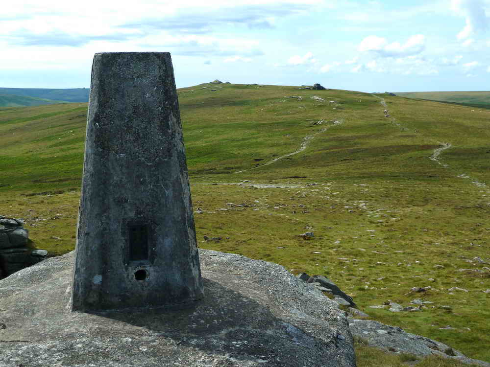 Yes Tor triangulation pillar with High Willhays in the distance, at SX 580 894, elevation 621 metres (2037 feet)