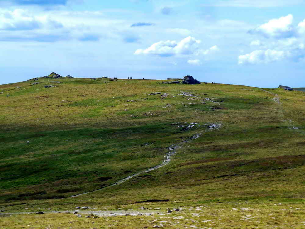 Walkers passing from Yes Tor going over High Willhays