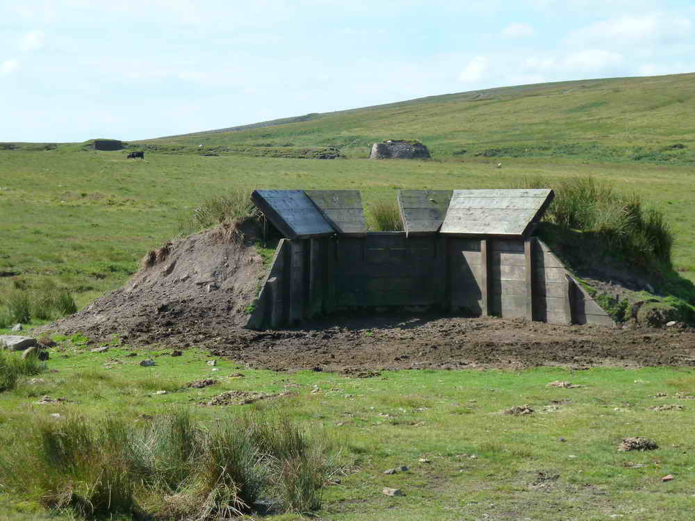 Firing point. The distant building, to the right, is the shed that houses the engine for the target railway